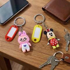 Customizable name tag on cartoon character keychain charm