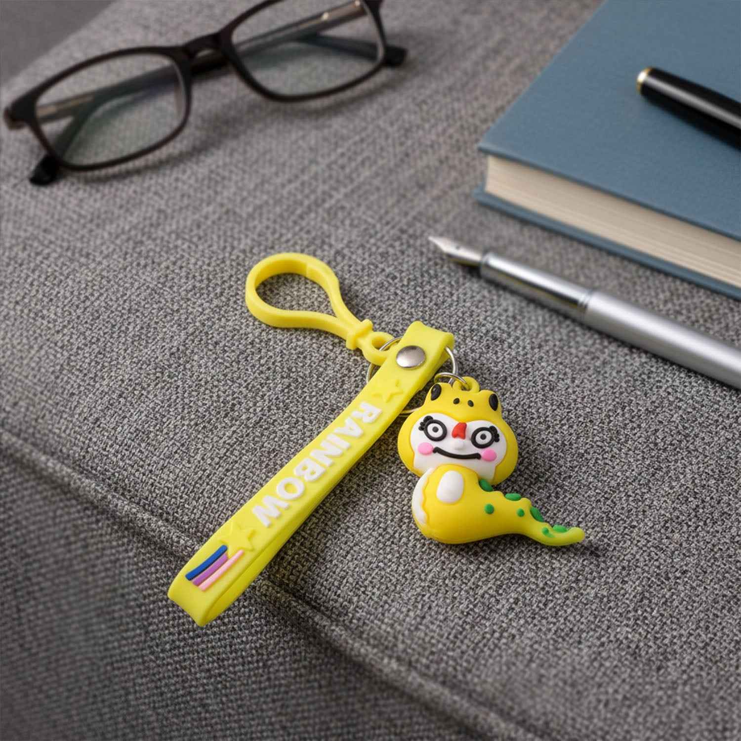 Dinosaur Keychain – Cute Cartoon Charm with Rainbow Strap