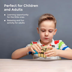 Golden Magic Puzzle Cube placed on desk for brain teaser game
