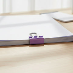 Close up of office stationery clips and pins for document organisation