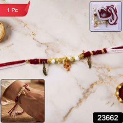 Rakhi Bracelet Ð Ethnic design with Ganesh charm and feather accents