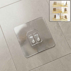 GlimmerHome transparent adhesive wall hook mounted on a clean, smooth wall.