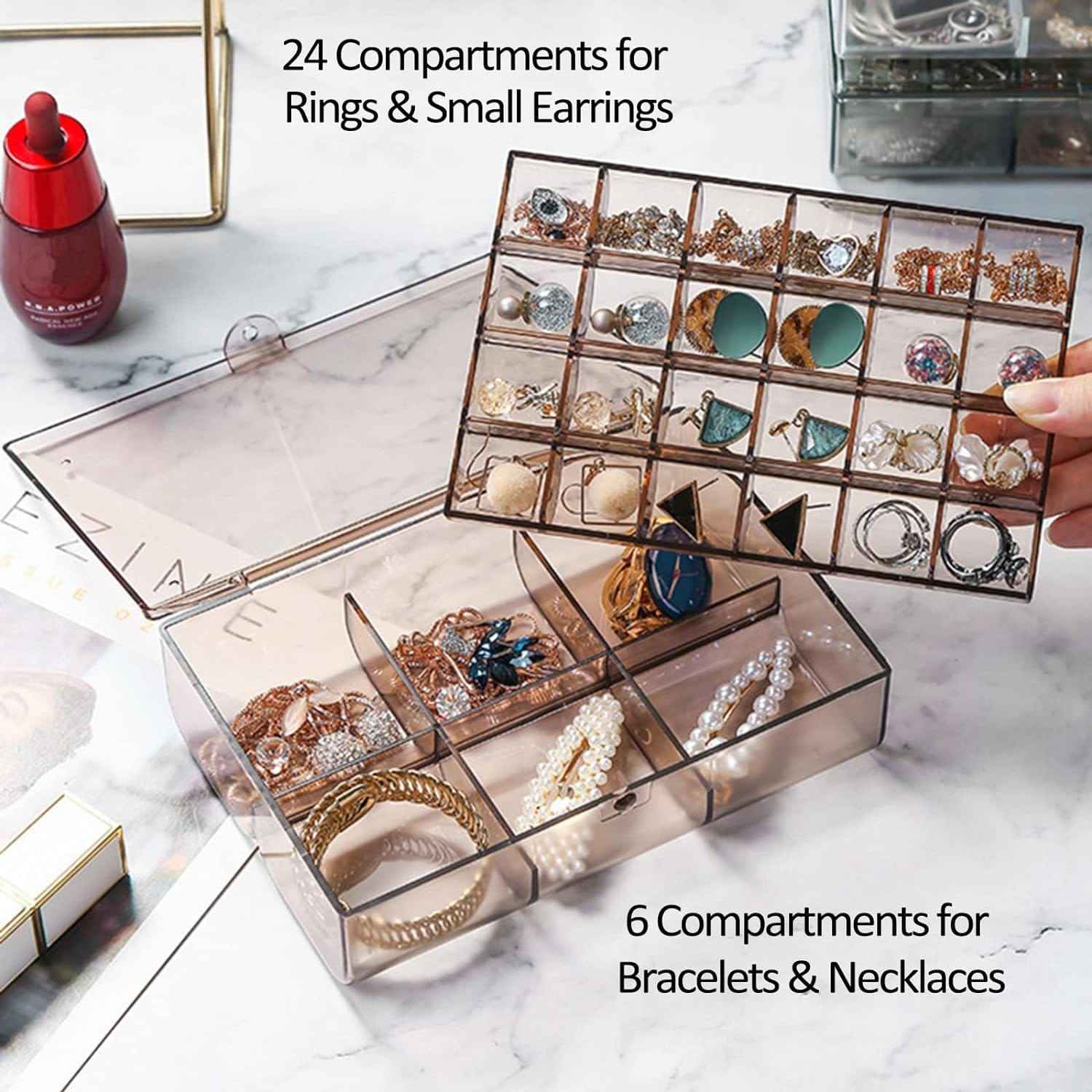 Open acrylic jewelry storage showing 24 small and 6 large compartments.