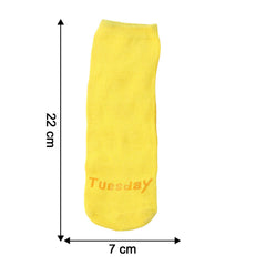 Yellow casual socks laid flat showing crew length size