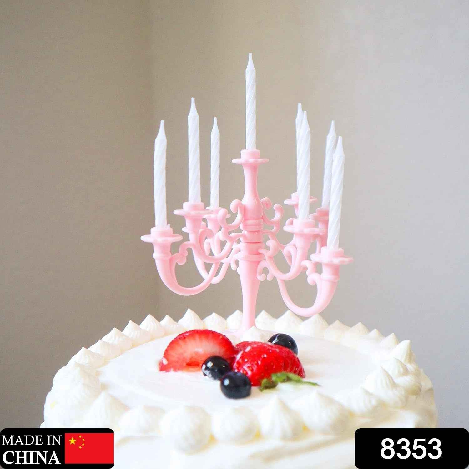 Close-up of the elegant candle holders and metallic birthday candles, showcasing their intricate design.