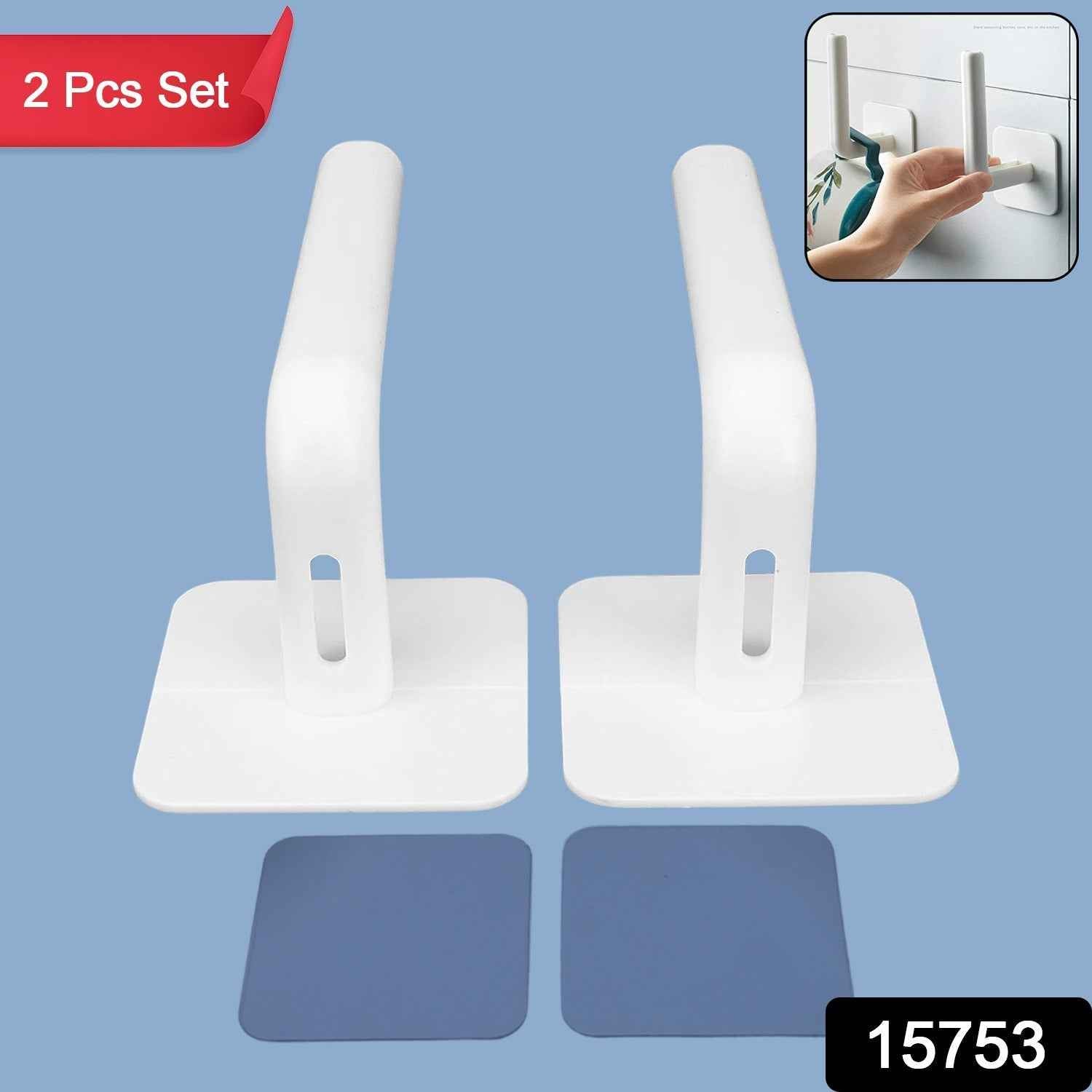Close-up of the white hanging storage rack showing its drain holes and capacity for small items like sponges or toiletries.