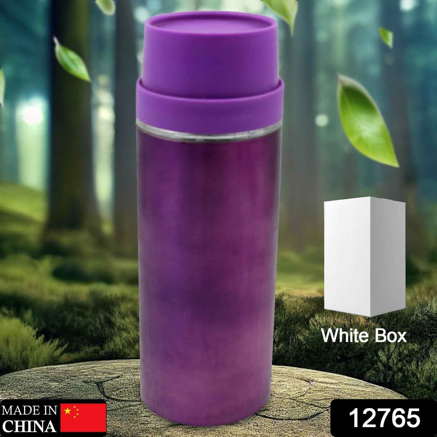Sleek stainless steel sipper bottle on a wooden surface, ready for use.