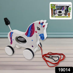 Close-up view of the friendly face and horn of the Unicorn pull along toy