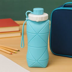 Foldable silicone water bottle compactly stored for outdoor use