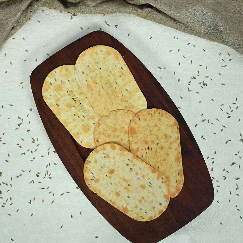 Maniarr's Carmonised Ragi Diet Thins packaging with jeera spices.