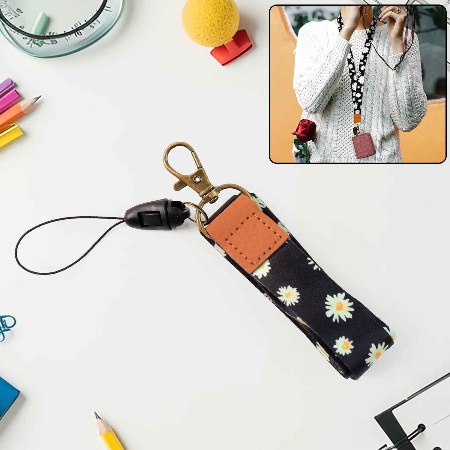 Floral print neck lanyard holding keys and ID badge with daisy design