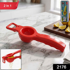 Hand holding the lemon squeezer to extract fresh juice from a lemon.
