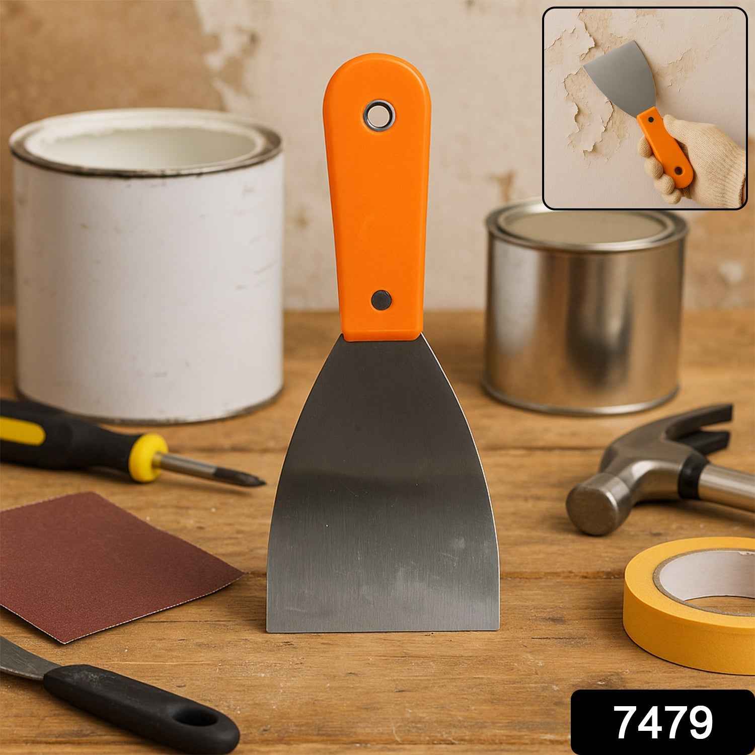 Close-up view of the ergonomic soft-grip rubber handle on the putty knife, ensuring comfort.