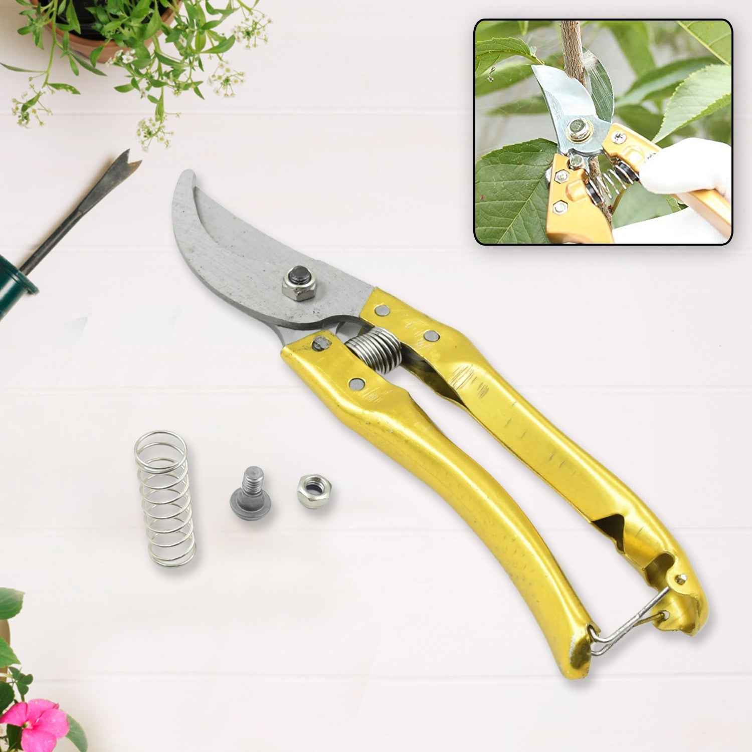 The garden shears stored safely in their plastic casing, highlighting convenient storage.
