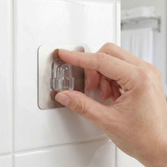Adhesive Plastic Wall Hook Ð Strong Hold & Reusable Design